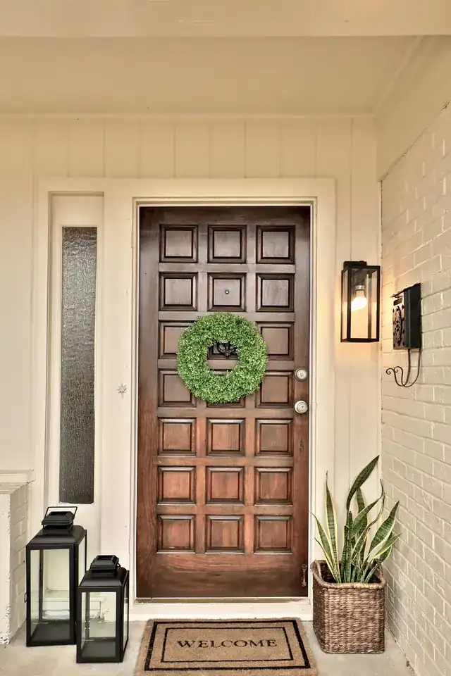 The solid wood front door at Green Acres, close up